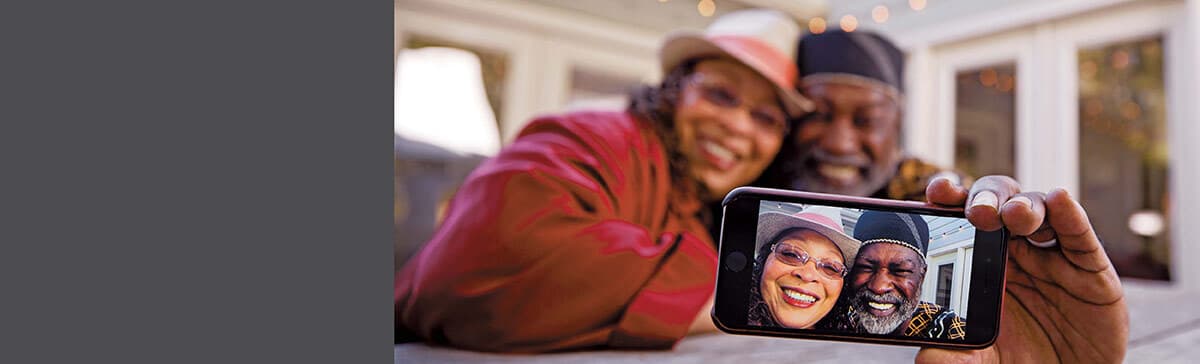 a woman and man taking a selfie