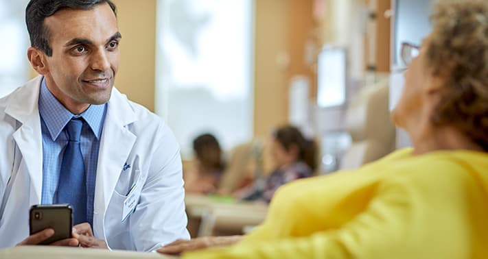 medical professional talking to a patient